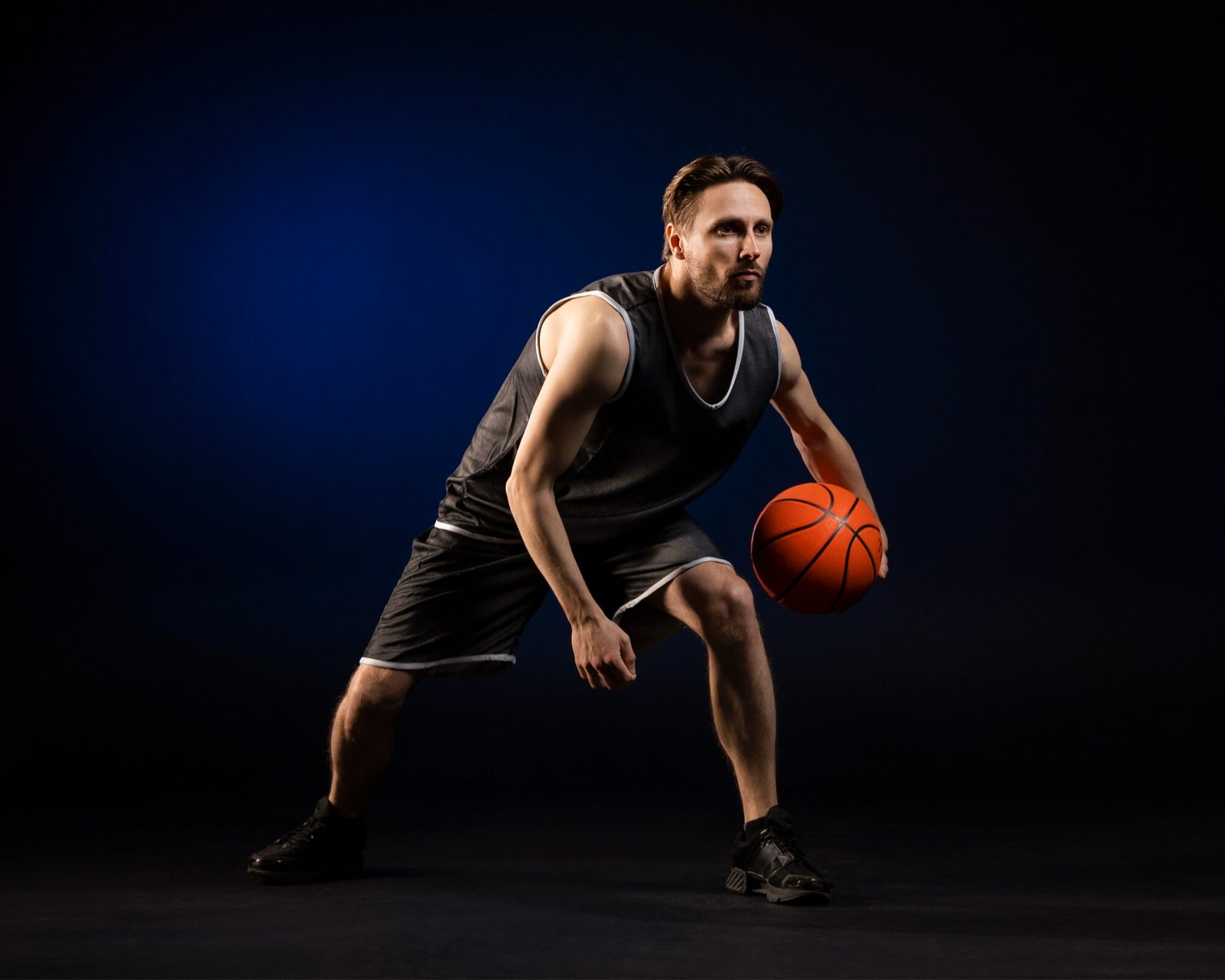 athletic-man-holding-basketball