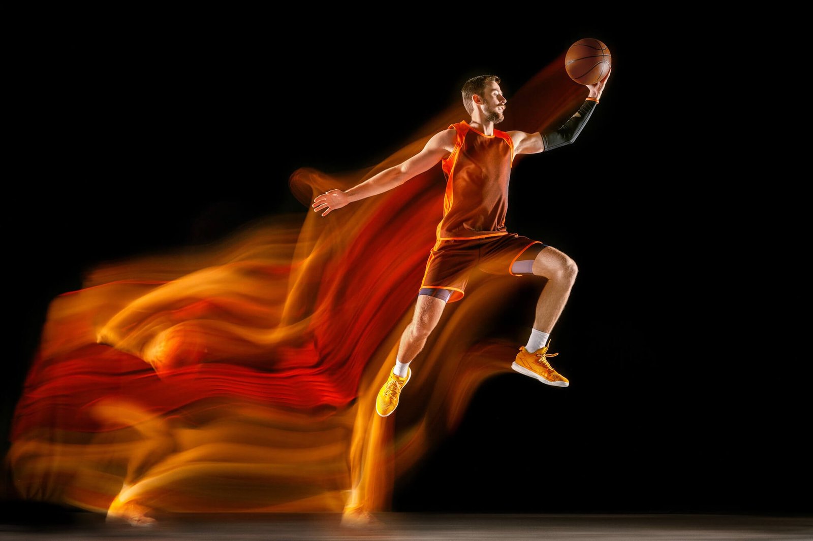 fire-tracks-young-caucasian-basketball-player-red-team-action